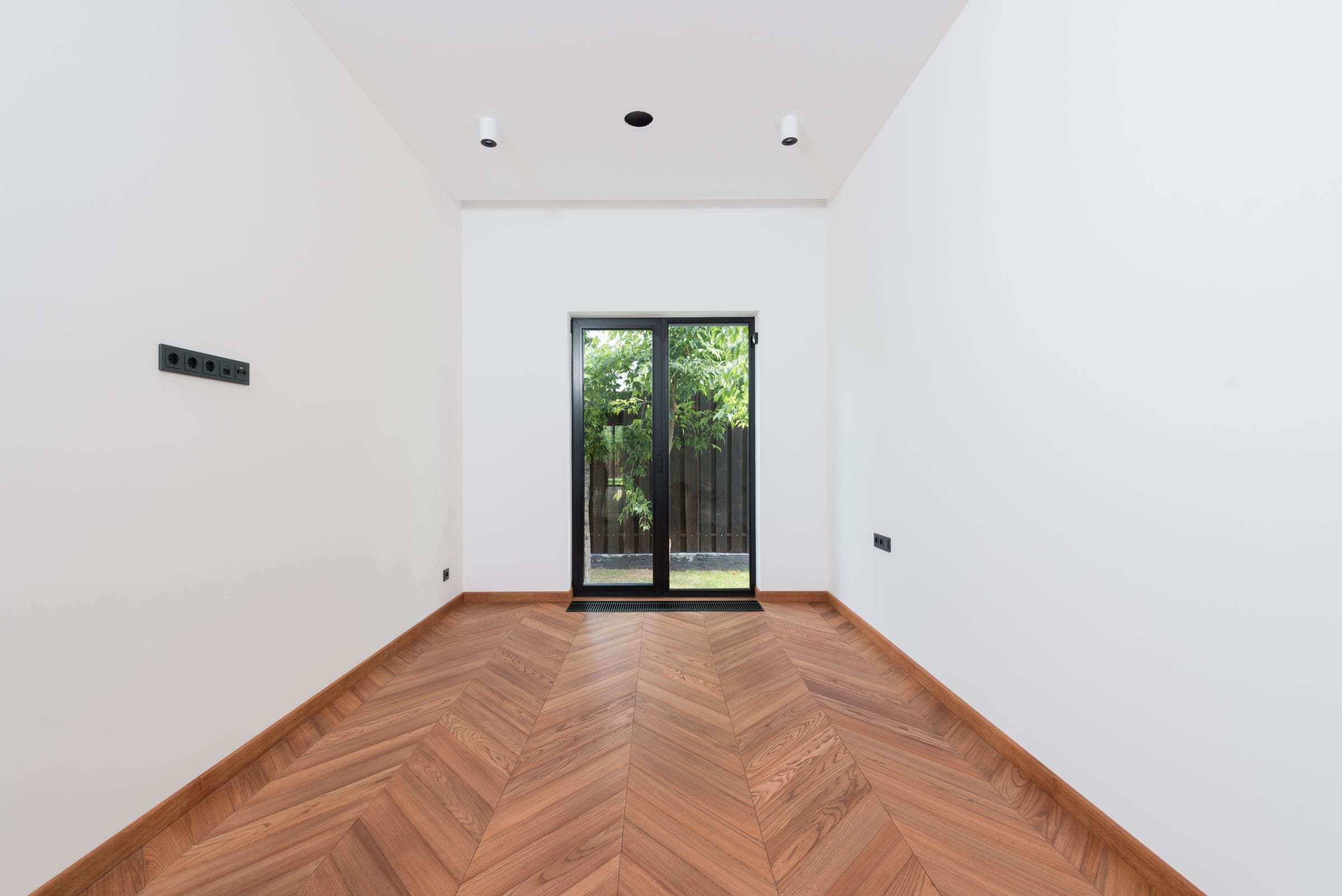 Après les travaux : séjour d’un appartement locatif à Renens