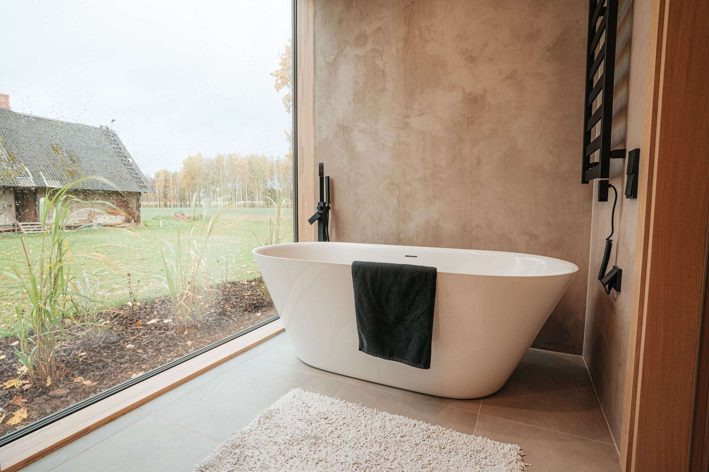 Salle de bain aux murs en tadelakt, villa à Pully